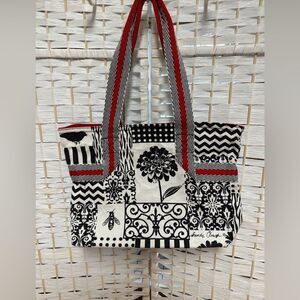 Sandy Clough tote/handbag like new floral‎ artsy print. Black white and red